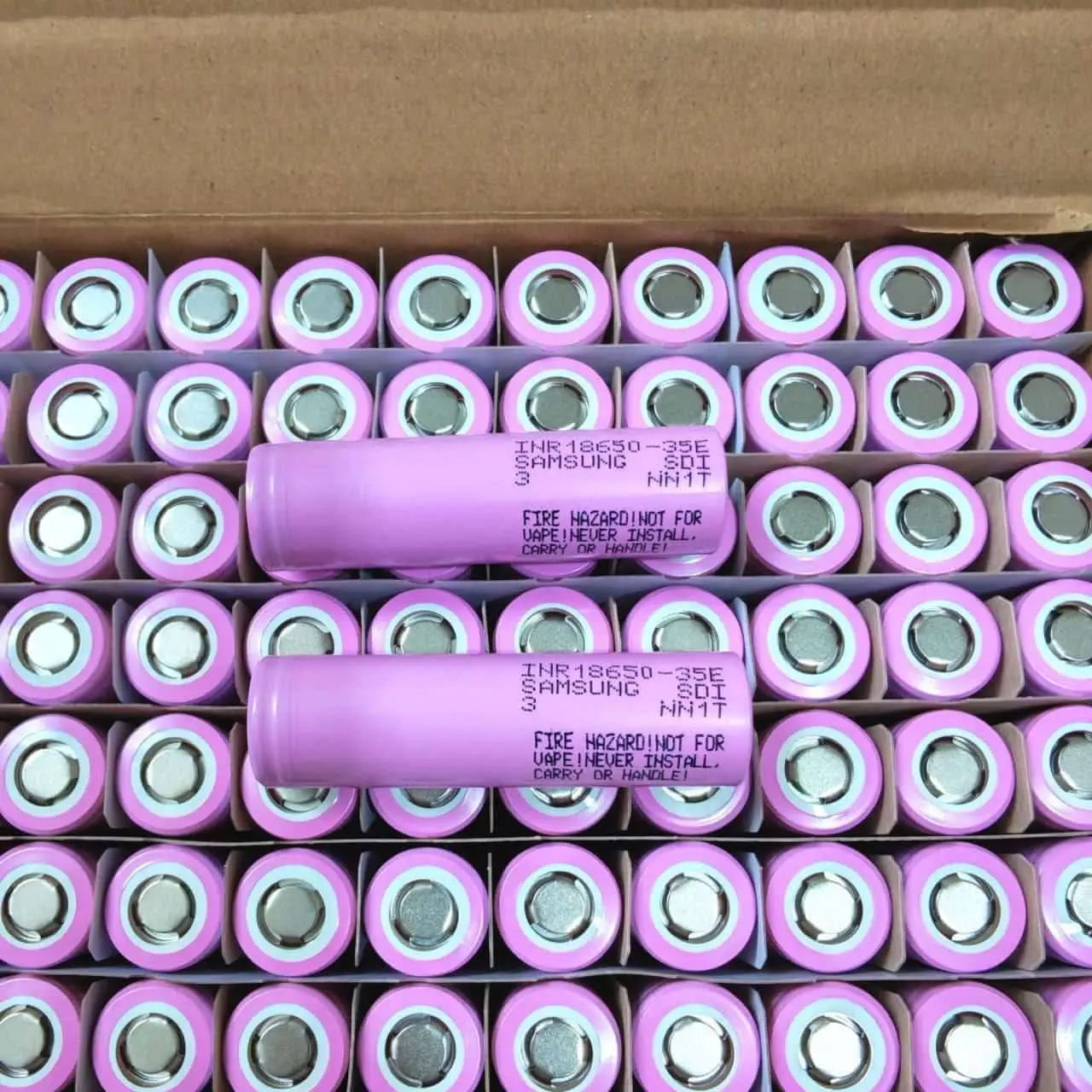 Lithium 18650 battery cells in a tray at a battery factory warehouse in China